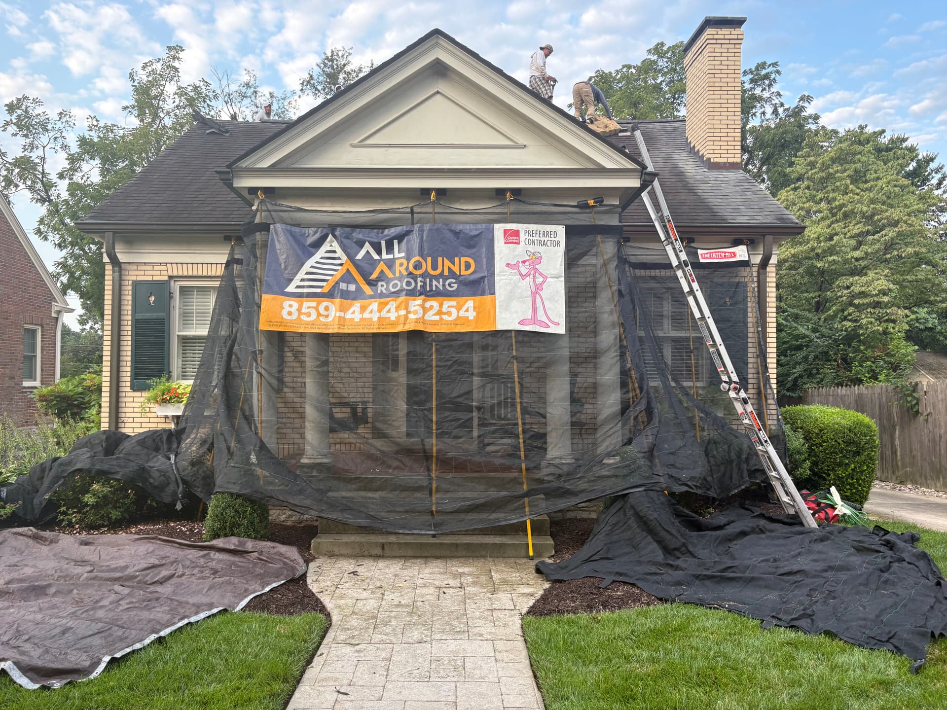 Full Roof Replacement in Progress on a Classic Brick Home image