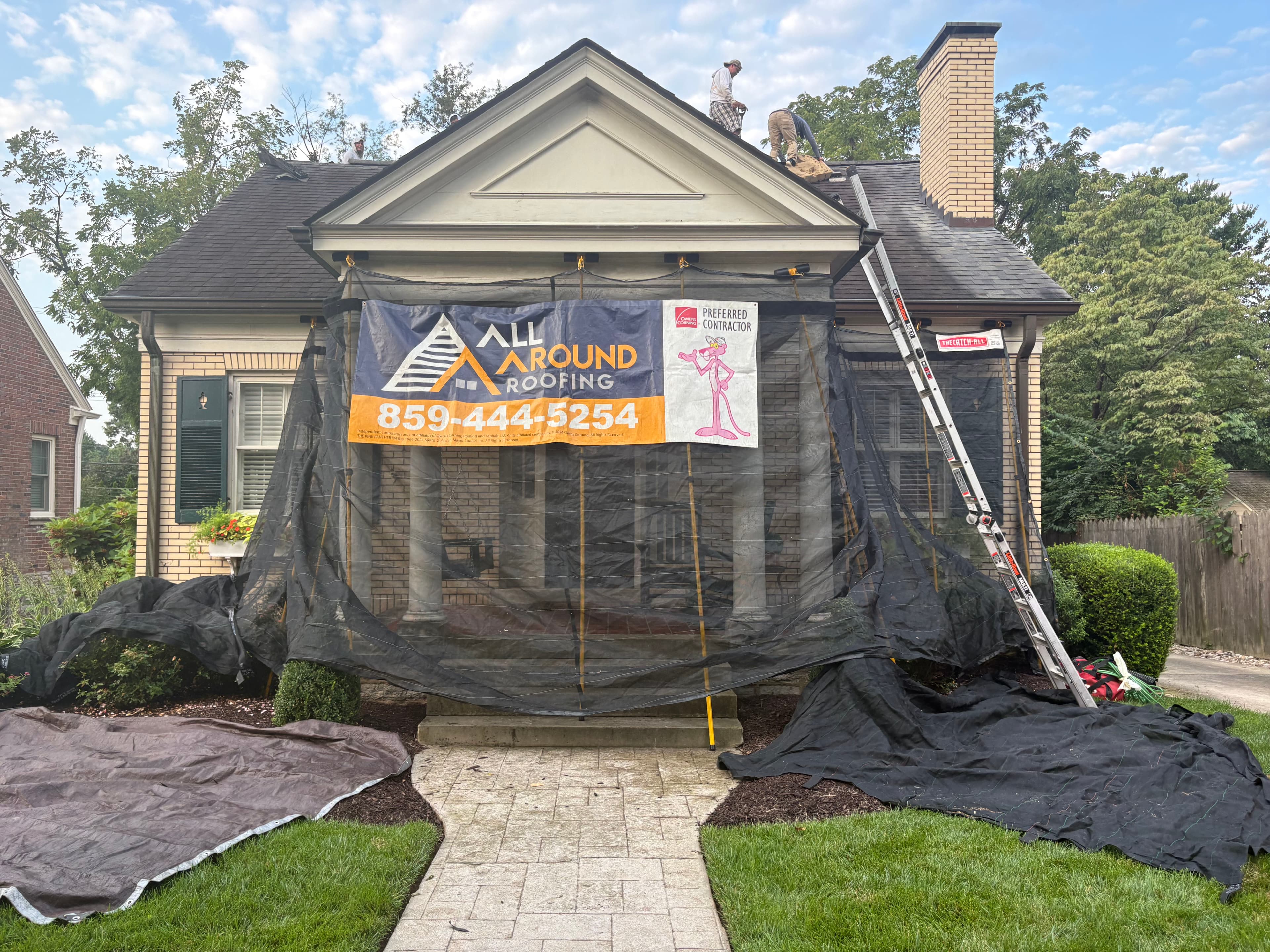 Project Full Roof Replacement in Progress on a Classic Brick Home image