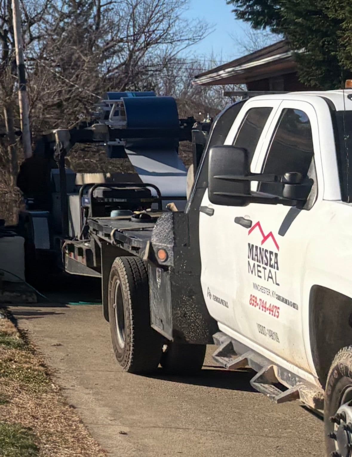 Efficient Metal Roof Installation with Onsite Rolling image